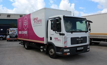 Lanes Group PLC branded truck carrying ultra violet rehabilitation equipment